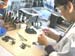 049 EMPLOYEE REALISANT LE MONTAGE DES MAGASINS